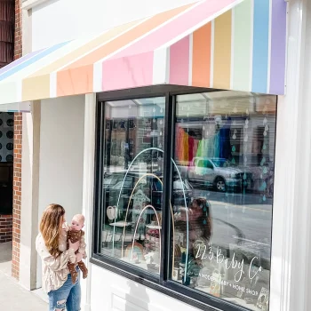 223 Baby Co. store front with Macy & Daughter Agnes, on The Local Hub Iowa City